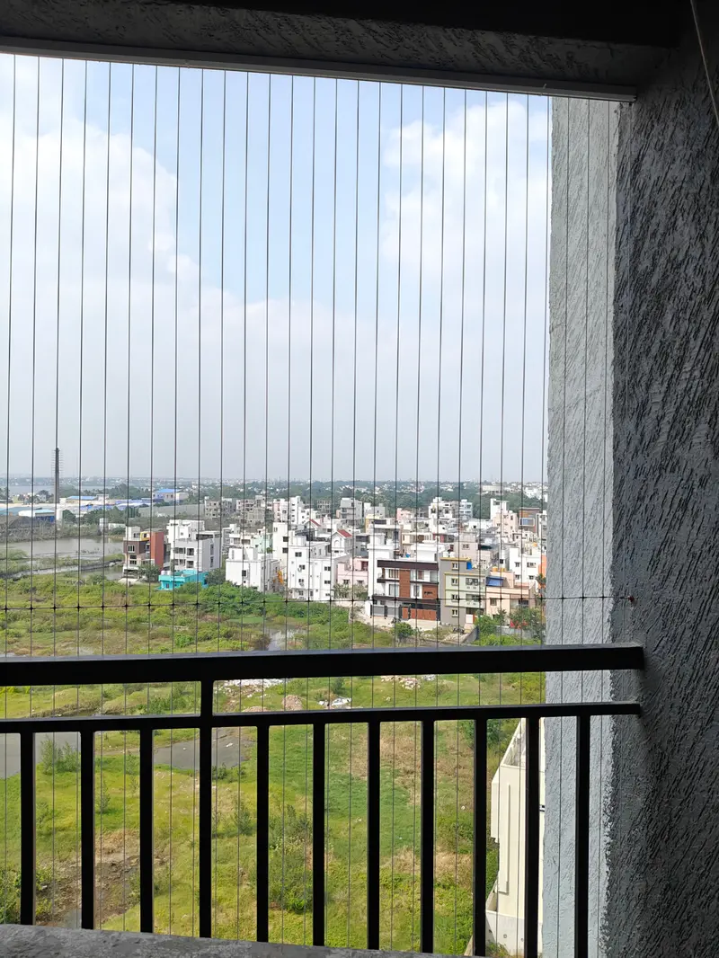 Invisible Grill For Balcony Installation In Anna Nagar — photo 4 of duplex balconies work completed in Anna Nagar, Chennai